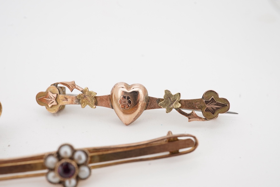 Three 9ct bar brooches, one gem set and a yellow metal split pearl and diamond chip set bar brooch, gross weight 10.1 grams.